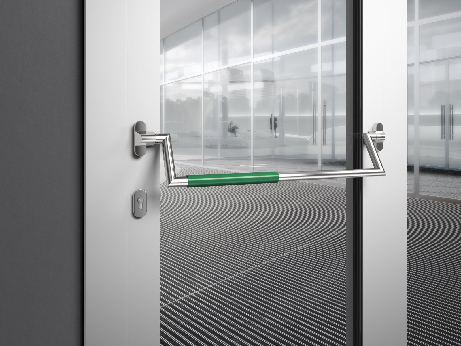 Panic bar on a public building door made of matt polished stainless steel with green polyamide handle tube