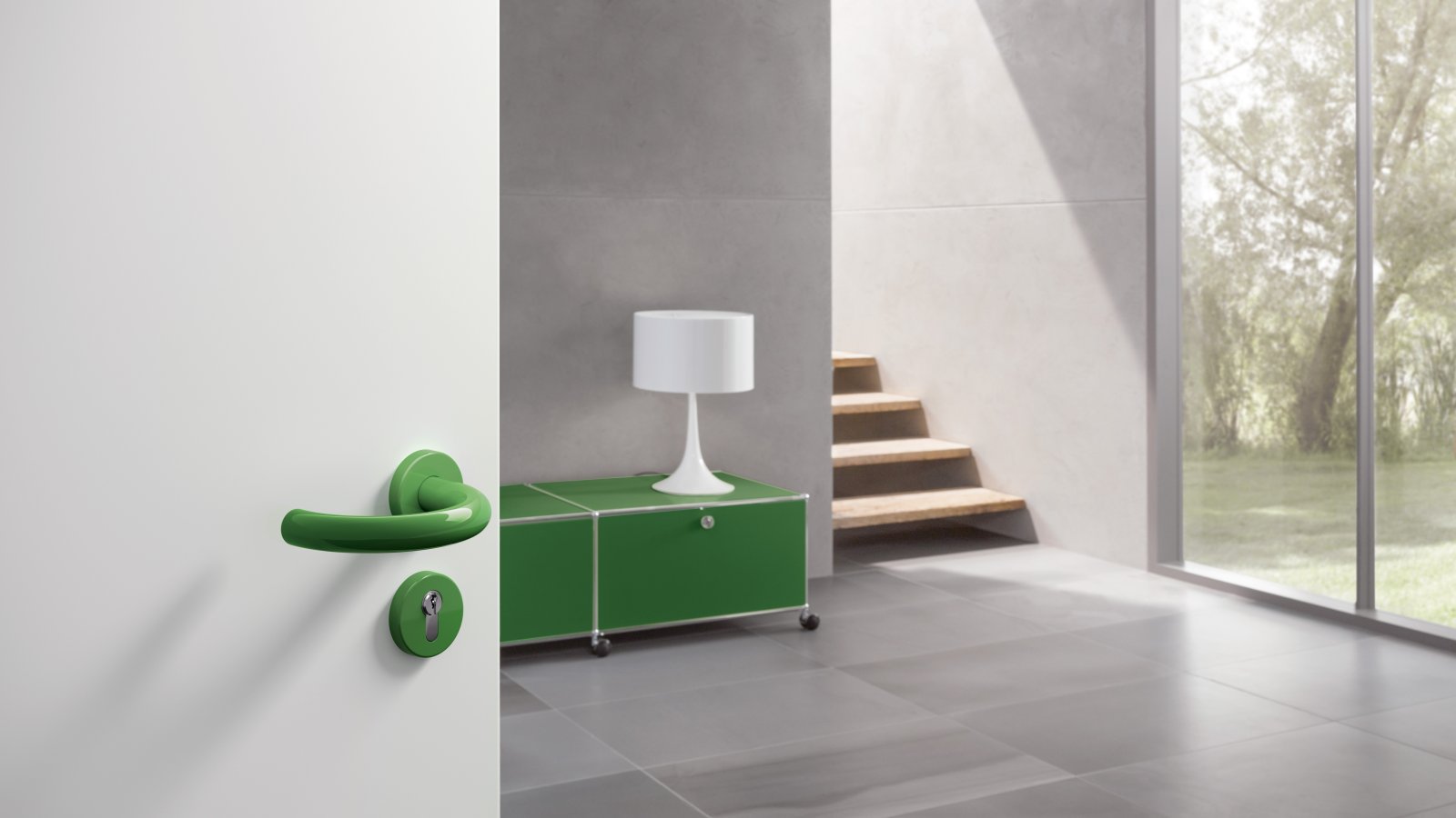 Lever handle with curved U-shape in the colour may green made of polyamide