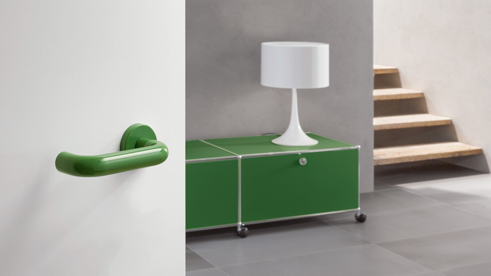 Lever handle in the colour may green made of polyamide