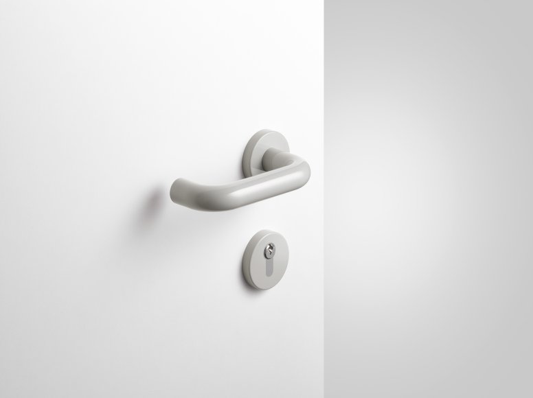 Lever handle with key rosette in the colour rock grey made of polyamide