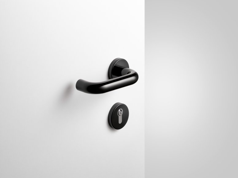 Lever handle with key rosette in the colour deep black made of polyamide