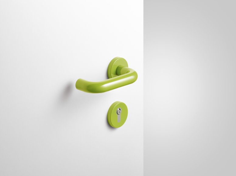 Lever handle with key rosette in the colour apple green made of polyamide