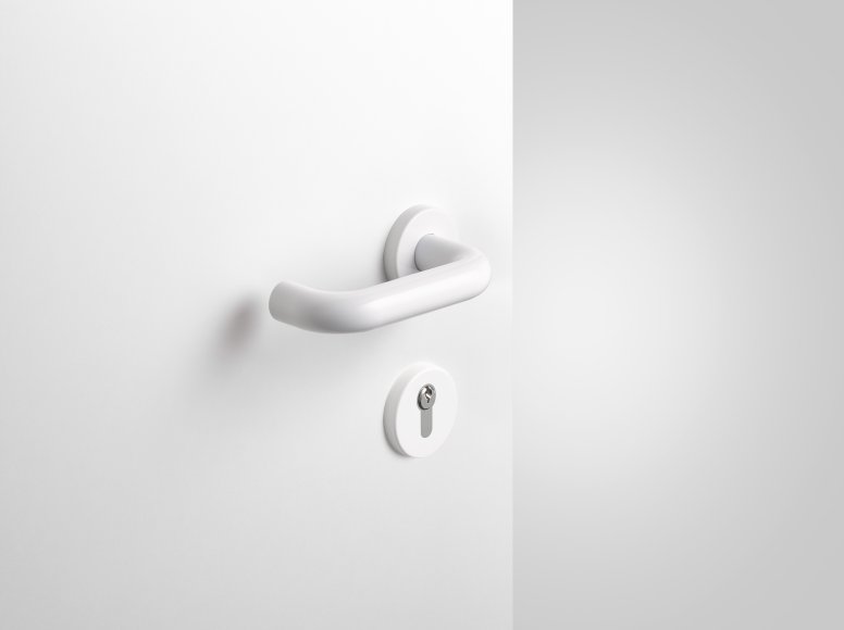 Lever handle with key rosette in the colour signal white made of polyamide