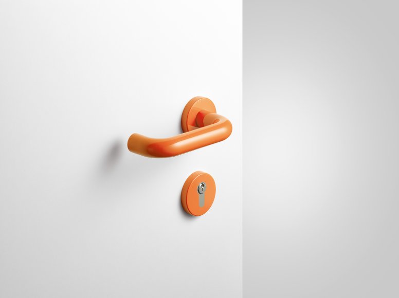 Lever handle with key rosette in the colour orange made of polyamide