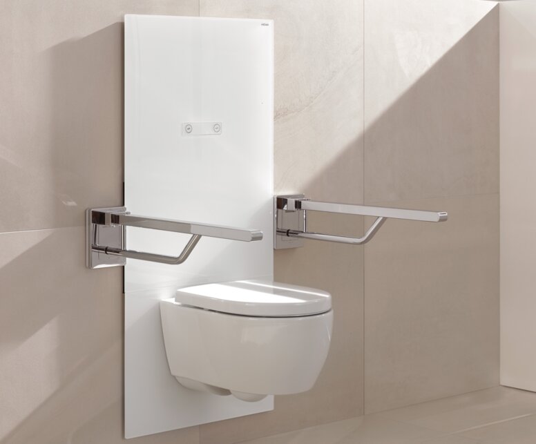 Height-adjustable WC module with folding support handle