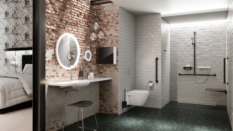 Barrier-free hotel bathroom with washbasin, shower area and WC