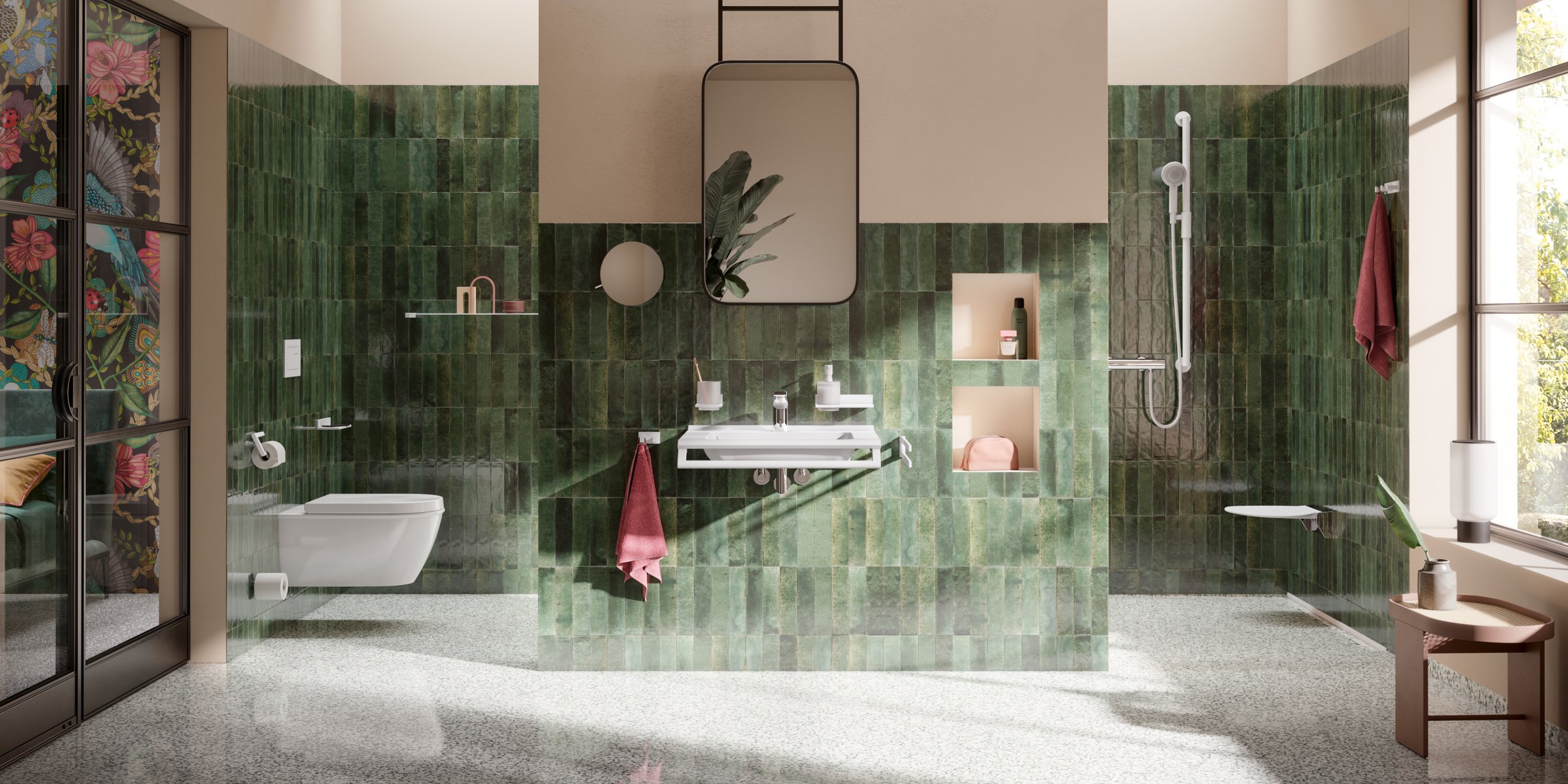 Badezimmer mit grünen Fliesen, WC-Bereich, Duschbereich und Waschbecken, ausgestattet mit weißen Sanitäraccessoires
