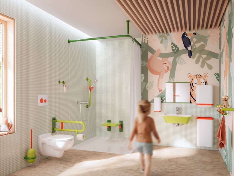 Farbenfrohes und kinderfreundliches Badezimmer ausgestattet mit Sanitäraccessoires in den Tönen Grün, Weiß und Koralle