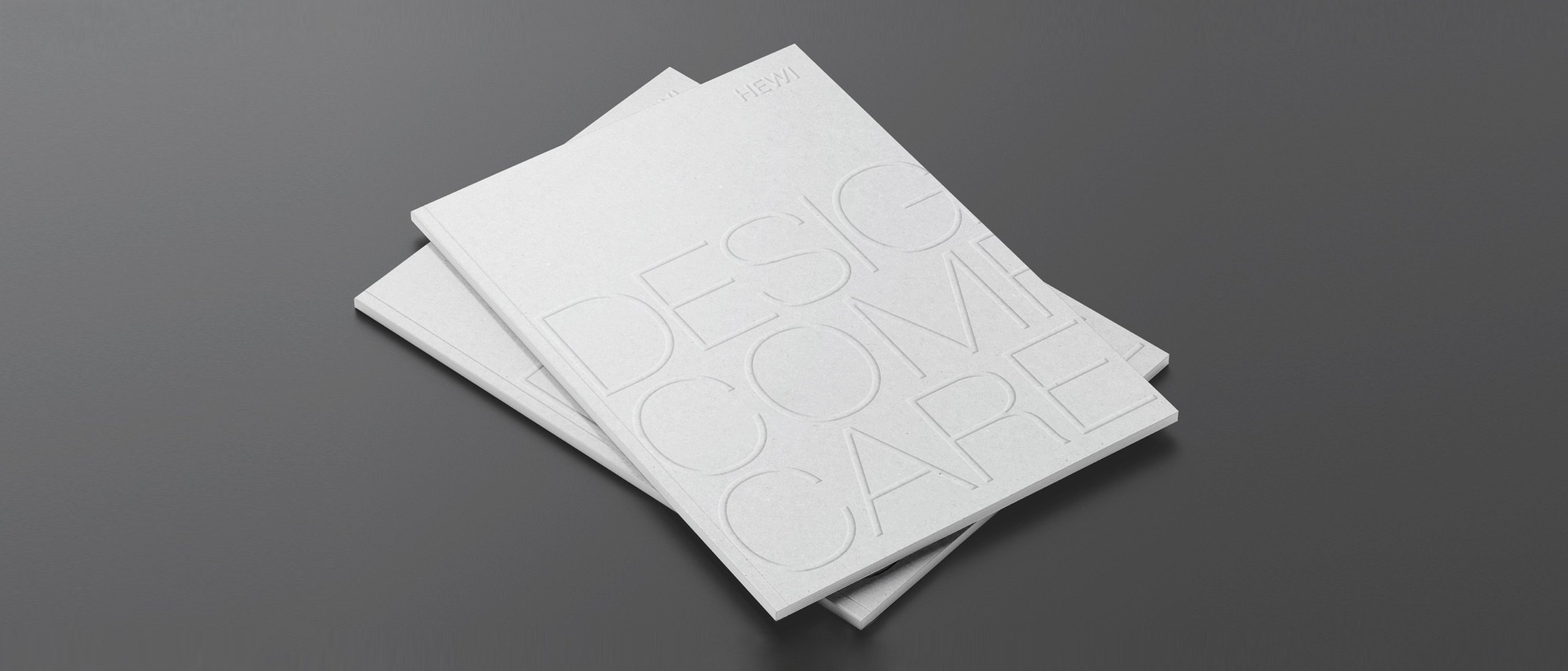 Two stacked brochures labelled Design Comfort Care